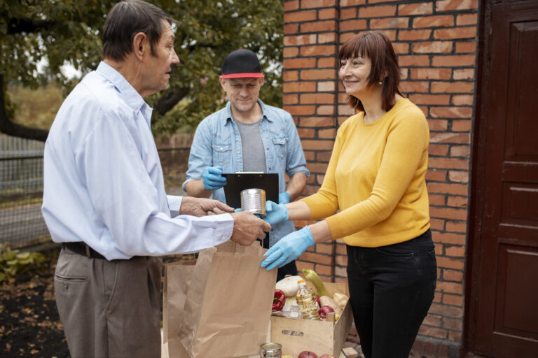 person-helping-their-elder-neighbour